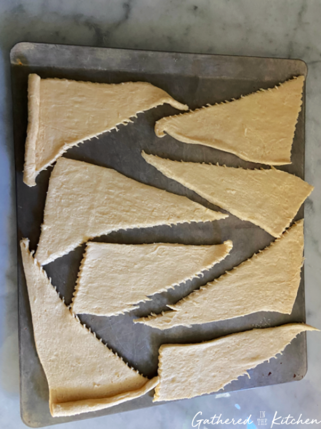 crescent rolls on a baking sheet