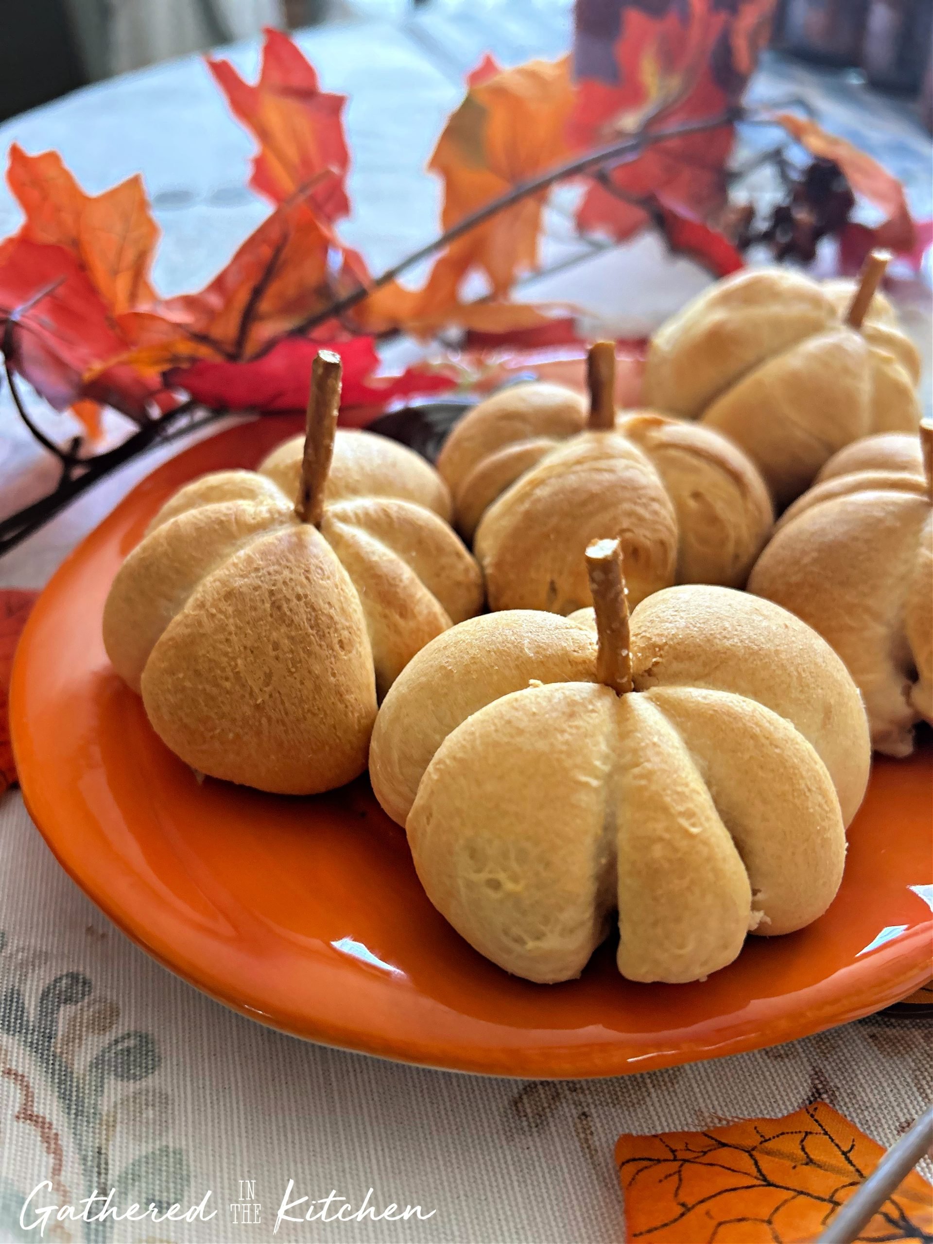 These cheese-stuffed pumpkin-shaped crescent rolls are the perfect festive appetizer for fall gatherings! Easy to make with Pillsbury crescent dough, they're sure to be a crowd favorite at your next party.