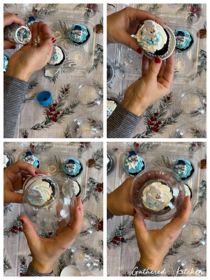 Step-by-step process of assembling Dollar Tree snow globe cupcakes using store-bought snowman cupcakes, sprinkles, and clear plastic snow globes on a holiday tablecloth with pine and berry decorations. | Gathered In The Kitchen 