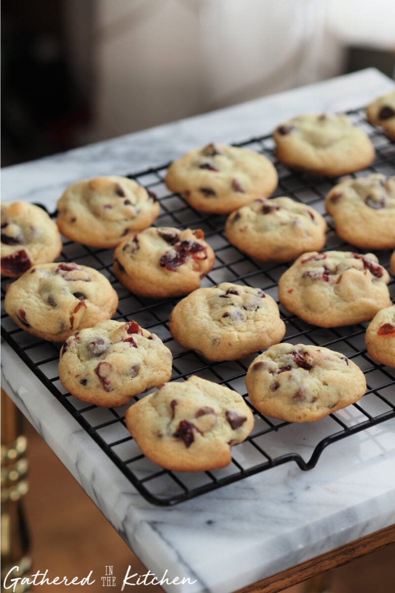 Soft cranberry chocolate chip cookies cooling on rack | Gathered In The Kitchen 